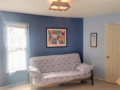The large third bedroom has a walk-in closet, door
