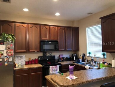 Kitchen open to both LR and DR with granite counte