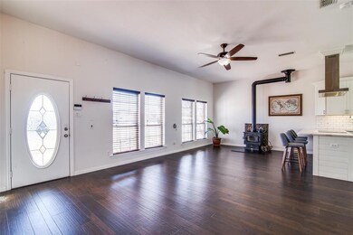 Engineered hardwoods, wood burning fireplace, pre-wired for 7.1 surround sound!