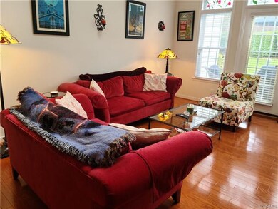 Family Room with hardwood floors and 9 ft ceilings
