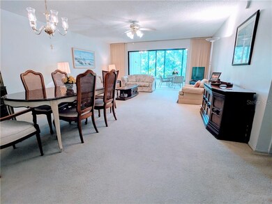 Great room and dining room is open to the glassed 