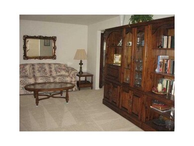 Living Room. Living room with neutral carpeting.