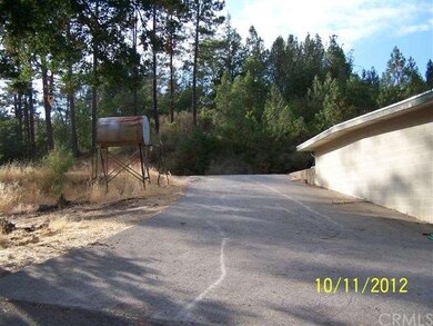 Driveway to rear of house.
