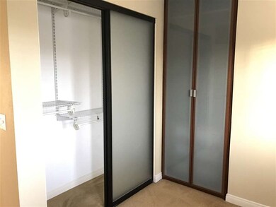 Bedroom closet with upgraded doors & organizers