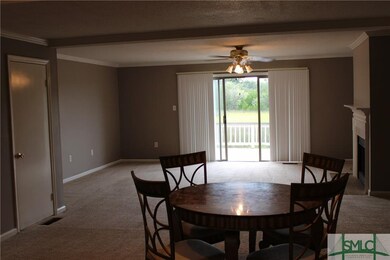 Looking from kitchen back over dining and great ro