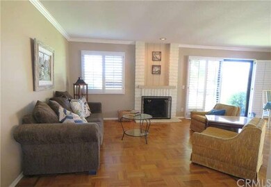 Living room looks out at the golf course