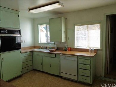 Kitchen with wall oven.