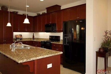 Upgraded kitchen includes: Pendant lighting, Grani