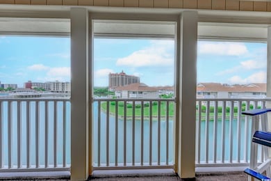 Exterior space with a water view