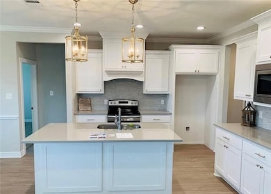 Kitchen featuring stainless steel appliances, prem