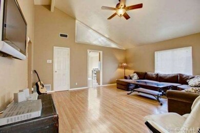 Large family room with vaulted ceilings.