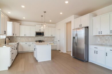 (*Photo of similar home, actual homes colors and finishes will vary) The chef ready kitchen!