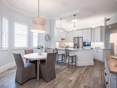 Dining area a wealth of natural light, crown moldi