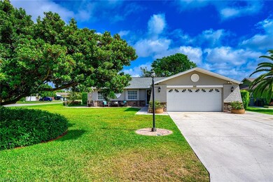 Front view w/ two car garage.