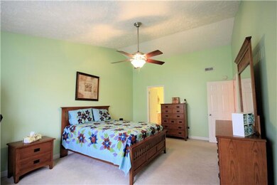 WHAT A LOVELY MASTER INCLUDING UPGRADED LIGHT/CEILING FAN, WALK-IN CLOSET, AND ENOUGH ROOM FOR ALL YOUR FAVORITE DECOR. 