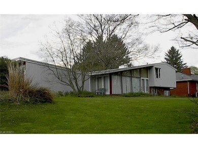 Back view from west side of wooded back yard