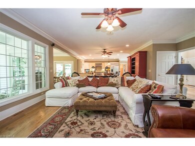 Front hall opens to the living spaces of the home