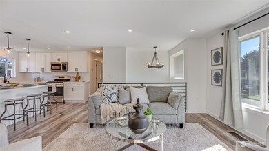 Just some of the many newer updates include luxury vinyl plank flooring, recessed lighting, stylish light fixtures, wrought-iron railings, and more!