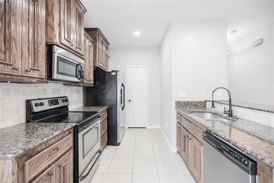 13165 Snow Ln unit 5, Willis, TX 77318 - photo 7