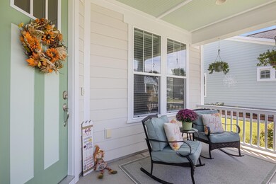 Wooden terrace featuring covered porch