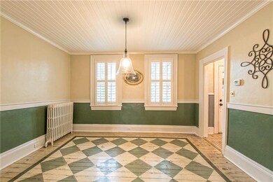 Off the spacious foyer is the expansive dining roo