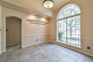 Large Dining area with Lighted Art Niches, High Ceilings, Updated Lighting.