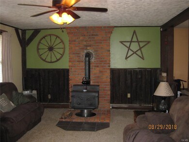 FAMILY ROOM WITH WOOD STOVE