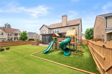 View of play area with a residential view