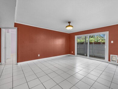A cozy living room with terracotta-colored walls,