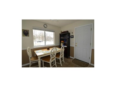 Large eat-in area next to the kitchen... looks out