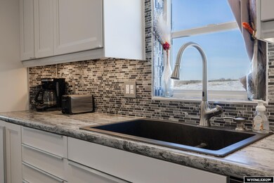 3858 Sand Drift Cir, Evansville, WY 82636 - photo 5