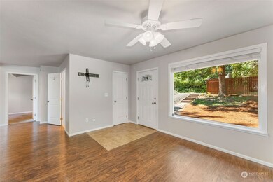 Great living room with an area for a pellet stove ( was removed) or leave as is and place your a/c there.