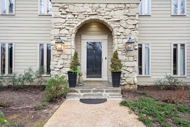 View of exterior entry with stone siding