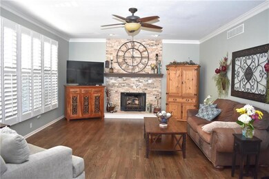 Living Room Has New Accent Fireplace, Hardwood Flo
