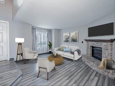 Entry Foyer and Living Room with Electric Fireplac
