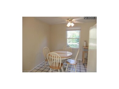 The eating area is open to the living room and off