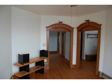 Living Room. The living room opens to the dining r