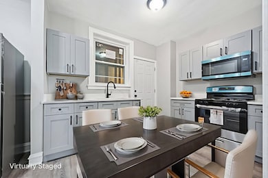 Photo is from a similar unit in the building.