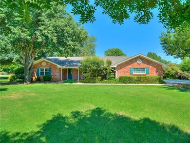 Front Exterior. Gorgeous landscaping. Brand new ro