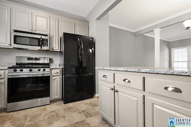 Comes with all the appliances, including the fridge. There is a great peninsula for extra workspace and storage.