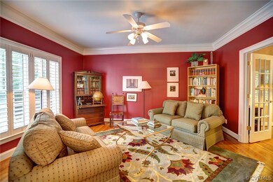 Living Room includes wood floors, ceiling fan, 4 m