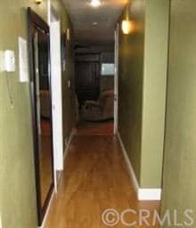 Hallway leads to a large cozy Family Room