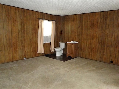 Living Room - Powder Room can easily be enclosed.