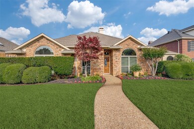 View of front of house with a front yard
