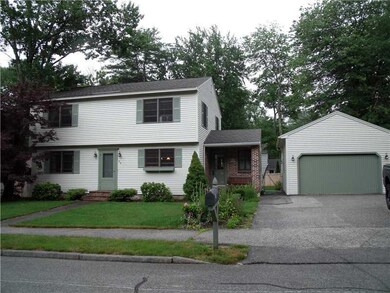 Exterior Front. Garage Door and...
