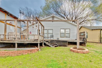 Backyard with view of deck.