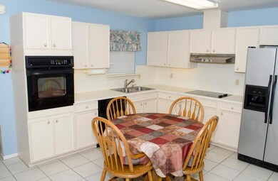 Spacious Kitchen with lots of cabinet space.