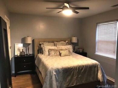 Bedroom is a great size with beautiful wood floors