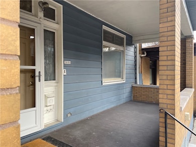 Large Front Patio, facing East St