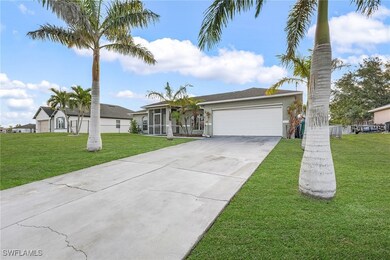 Single story home featuring concrete driveway, a g